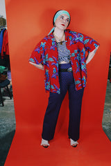 Men's vintage 1970's Michael Gerald Ltd., Hand Screened short sleeve button up shirt in an all over Hawaiian print with parrots.