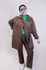 Women's vintage 1970's lightweight brown colored pea coat with a double breasted closure. Brown buttons and white contrast stitching