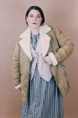 Men's or women's vintage 1970's Skinny's Hideout, Knight Tailors LTD. Australasia, Made in New Zealand label size large long sleeve tan brown suede medium length coat with cream shearling liner.