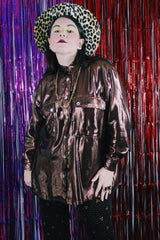 Women's vintage 1980's Made in USA long sleeve button up blouse with two chest pockets and pearly buttons.