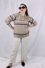 Women's or men's vintage 1980's Norsewear, Made in New Zealand label long sleeve pullover sweater in a tan brown color with abstract print across chest.