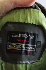 Men's or women's vintage 1970's The Country Coat, Sears The Men's Store label long sleeve dark brown colored jacker in corduroy material with double lapel and leather buttons.
