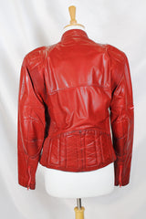 Women's or men's vintage 1980's Wilson's Suede & Leather long sleeve zip up short fit bright red leather moto style jacket.