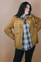 Men's or women's vintage 1970's Genuine Leather label size medium long sleeve light tan brown suede western style jacket with popper buttons.