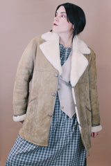 Men's or women's vintage 1970's Skinny's Hideout, Knight Tailors LTD. Australasia, Made in New Zealand label size large long sleeve tan brown suede medium length coat with cream shearling liner.