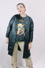 Women's vintage 1970's Dan Di Modes label mod style black leather jacket with leather buttons and pockets.