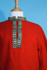 Women's vintage 1960's Product of Norway, Manufactured by Petersen & Dekke label Norwegian style pullover sweater in red wool with decorative trim and metal clasp closures