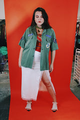 Men's vintage 1960's Guaranteed Trooper Fatigues label short sleeve army green button up shirt or jacket with US Air Force patches all over.