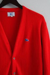 Women's or men's vintage 1980's Izod Lacoste label long sleeve bright red colored button up cardigan sweater with small alligator patch on left chest.