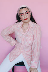 Men's or women's vintage 1970's Montgomery Ward label long sleeve cotton and polyester material pink striped button up shirt with clear buttons.