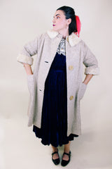 Women's vintage 1960's Mademoiselle Vogues, Fashions in Good Taste 3/4 arm length knee length coat in a wool cream color and cream fur trim on neckline and cuffs.