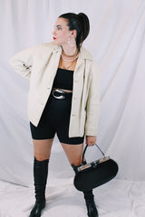 Women's vintage 1960's Custom Made Genuine Native Deerskin label long sleeve cream colored leather jacket. Fully lined, side pockets, and leather covered buttons.