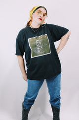 Women's or men's vintage 1997 Gildan Heavyweight, Made in Canada label short sleeve black The Kinks' Ray Davies The Storyteller tour tee with colored graphic and text on front and back.