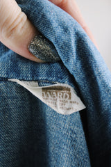 Women's vintage 1970's Montgomery Ward label long sleeve medium wash denim chambray top with snapper buttons.