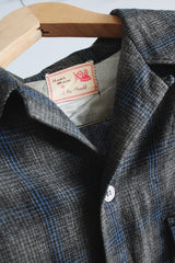 Men's vintage 1960's Hand Made by Alba Arnold label size large long sleeve button up shirt in blue and grey plaid in wool material. Has two chest pockets.