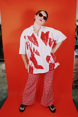 Men's vintage XL 1980's Yoyo's Hawaii, Made in USA label short sleeve white cotton shirt with collar and half button closure.