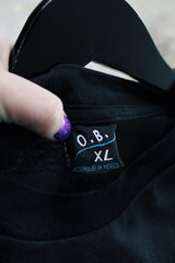 Women's or men's vintage 1999 O.B., Assembled in Mexico label short sleeve black Scorpions tour t-shirt with a colored graphic on front and back.