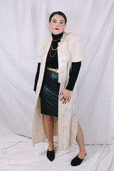 Women's vintage 1990's R & M Richards by Karen Wong label short sleeve long length duster dress in a cream satin like material. Long side slits, mandarin collar, and fabric covered buttons.f