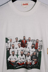 Women's or men's vintage 1986 Coca-Cola label short sleeve white tee with graphic on the front in a polyester and cotton material.