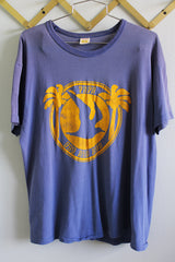 Women's or men's vintage 1970's Russell Athletic label short sleeve blue t-shirt with yellow graphic on the front.