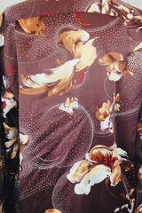 Men's vintage 1980's Tori Richard Honolulu, Made in USA label brown polyester button up shirt with all over floral print.