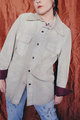 Women's or men's vintage 1970's Styled by William Barry label long sleeve grey colored suede jacket with maroon colored liner and popper buttons.