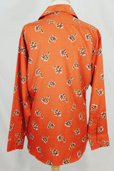 Men's or women's vintage 1970's Design Collection, Bonds label long sleeve lightweight polyester material burnt orange colored button up shirt with all over abstract floral print.