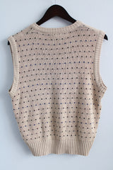 Men's or women's vintage 1970's Kennington California LTD. label sleeveless tan colored V shaped neckline sweater vest with dotted print all over in a soft acrylic material.