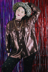 Women's vintage 1980's Made in USA long sleeve button up blouse with two chest pockets and pearly buttons.