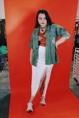 Men's vintage 1960's Guaranteed Trooper Fatigues label short sleeve army green button up shirt or jacket with US Air Force patches all over.