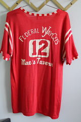 Women's or men's vintage 1970's Post label short sleeve red sports top with white stripes on arms, red and white trim, and white graphic with words on the back.