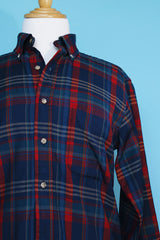 Men's vintage 1980's Pendleton, Sir Pendleton label long sleeve button up plaid shirt in a wool material. Red and navy colors with brown tortoise buttons.