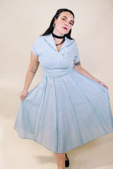 Women's vintage 1960's Toni Todd Original label short sleeve midi length light blue sheer a line dress.