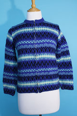 Women's vintage 1970's long sleeve printed zip up sweater in different shades of vibrant blue in a soft wool material. Norwegian style.