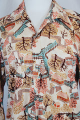 Men's or women's vintage 1970's long sleeve cream colored polyester button up shirt with all over multi colored tree print shirt.