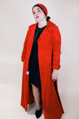 Women's vintage 1950's/60's Count Romi LTD., Your All Weather Traveler label long sleeve long length bright red velvet duster coat. One closure at waist.