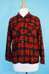 Men's or women's vintage 1960's Pendleton label long sleeve button up plaid shirt in wool material. Red and green colors.