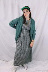 Women's or men's vintage 1970's Alps, Rugged Outdoors, Merrimac Valley, New England label long sleeve green colored button up cardigan.