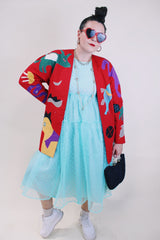 Women's vintage 1980's Mr. Girasol, Made in Mexico label long sleeve open front lightweight jacket in red with all over multicolored animals.