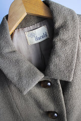Women's vintage 1950's Harold, Monte-Sano & Pruzan, New York label nubby wool textured grey colored jacket with big grey buttons and small peter pan collar.