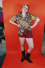 Women's or men's vintage 1970's Aloha Authentic Hand-Screened Originals label short sleeve Hawaiian print button up collared shirt in yellow, white, and brown colors.