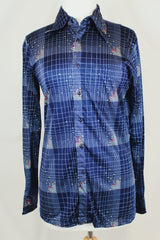 Men's or women's vintage 1970's Chemise Et Cie label long sleeve navy button up shirt with dagger collar and all over multi colored abstract print in slinky shiny polyester material.
