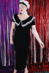 Women's vintage 1990's Jessica McClintock, Gunne Sax, Made in USA label short sleeve ankle length black velvet dress.