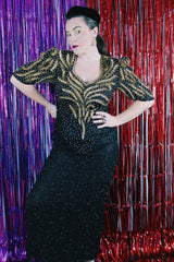 Women's vintage 1980's Mark & John by Sam, Made in India label long length short sleeve beaded and sequined dress in black and gold.