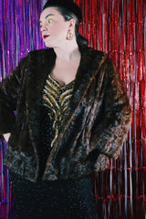 Women's vintage 1960's Fur Salon, M & T label long sleeve dark brown real fur evening jacket. No front closure, two side pockets and fully lined.