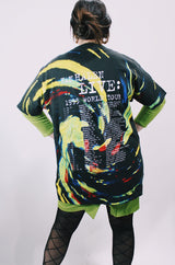 Women' or men's vintage 1993 Fruit of the Loom, Made in USA label short sleeve black 1993 Van Halen Tour t-shirt with graphic on the front and back with all over multicolored tie dye.