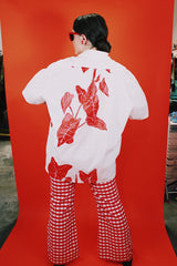 Men's vintage XL 1980's Yoyo's Hawaii, Made in USA label short sleeve white cotton shirt with collar and half button closure.