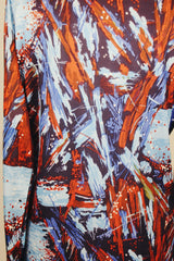 Men's vintage 1970's Joel label long sleeve button up shirt with all over red, blue, and navy abstract print in slinky polyester material.