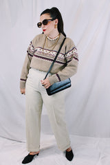 Women's or men's vintage 1980's Norsewear, Made in New Zealand label long sleeve pullover sweater in a tan brown color with abstract print across chest.