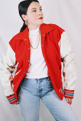 Men's or women's vintage 1960's US Doe-Lon, The Finest Fashion in VINYL label long sleeve red and white varsity letterman jacket with snap buttons and pockets.